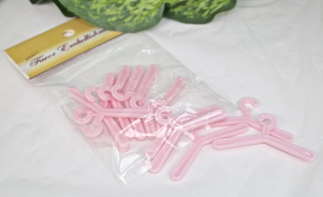 12 pcs; 2.25"- Plastic Hangers (Pink & Blue)